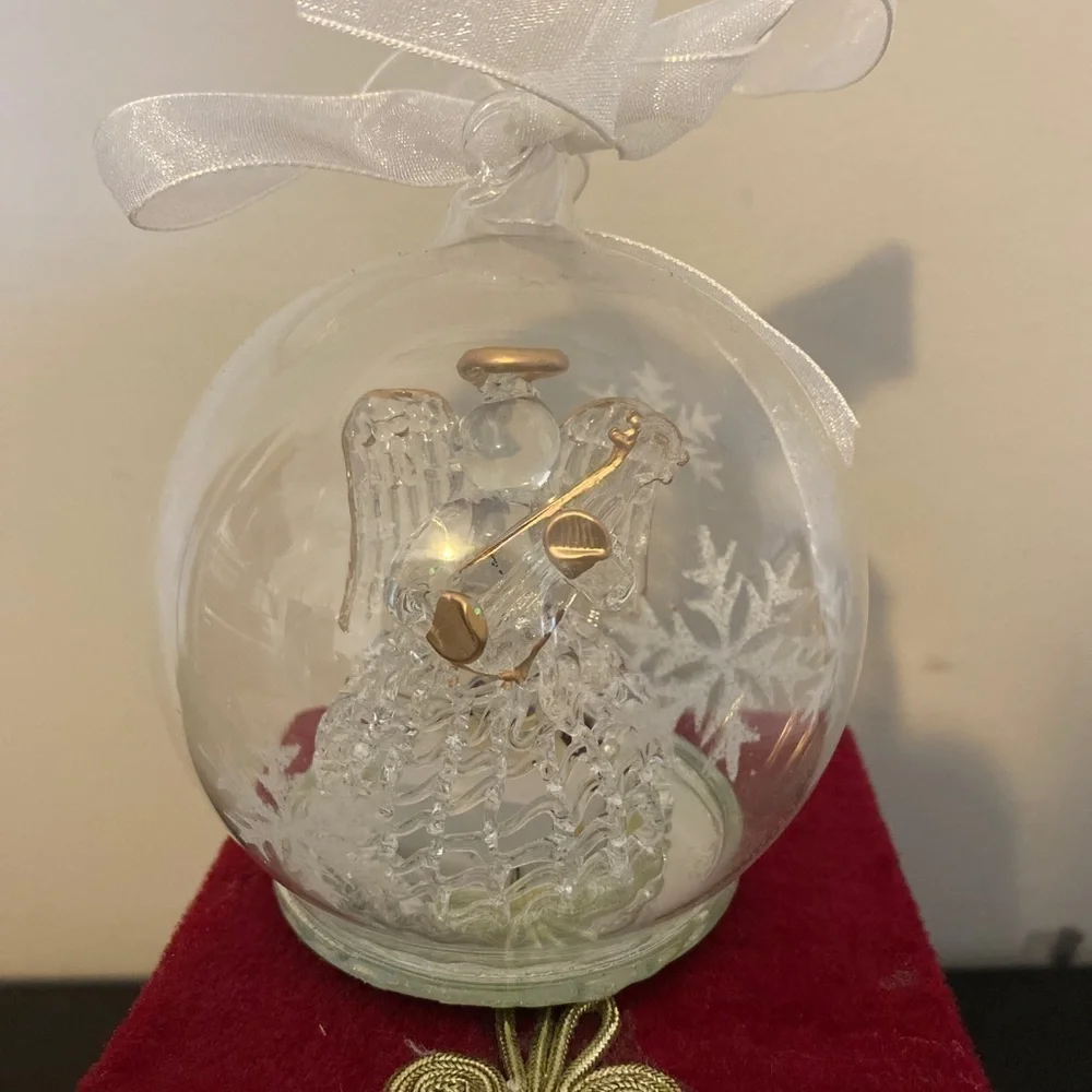 Beautiful Glass angel ornament that lights up.